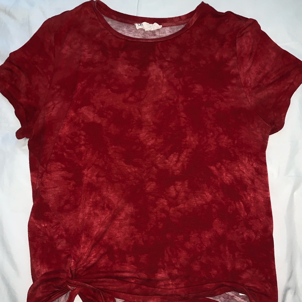 red t shirt with knot at bottom